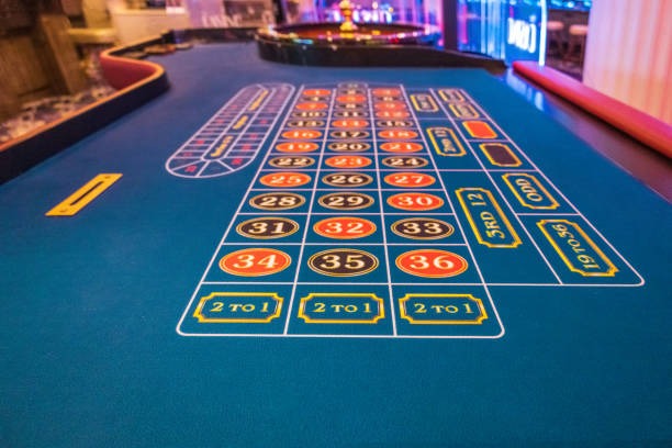 Roulette wheel and betting table layout during live Evolution Gaming session